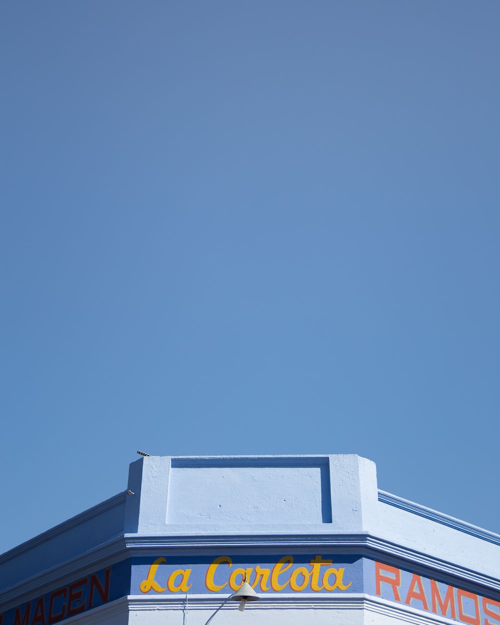 La Carlota building under blue sky during daytime
