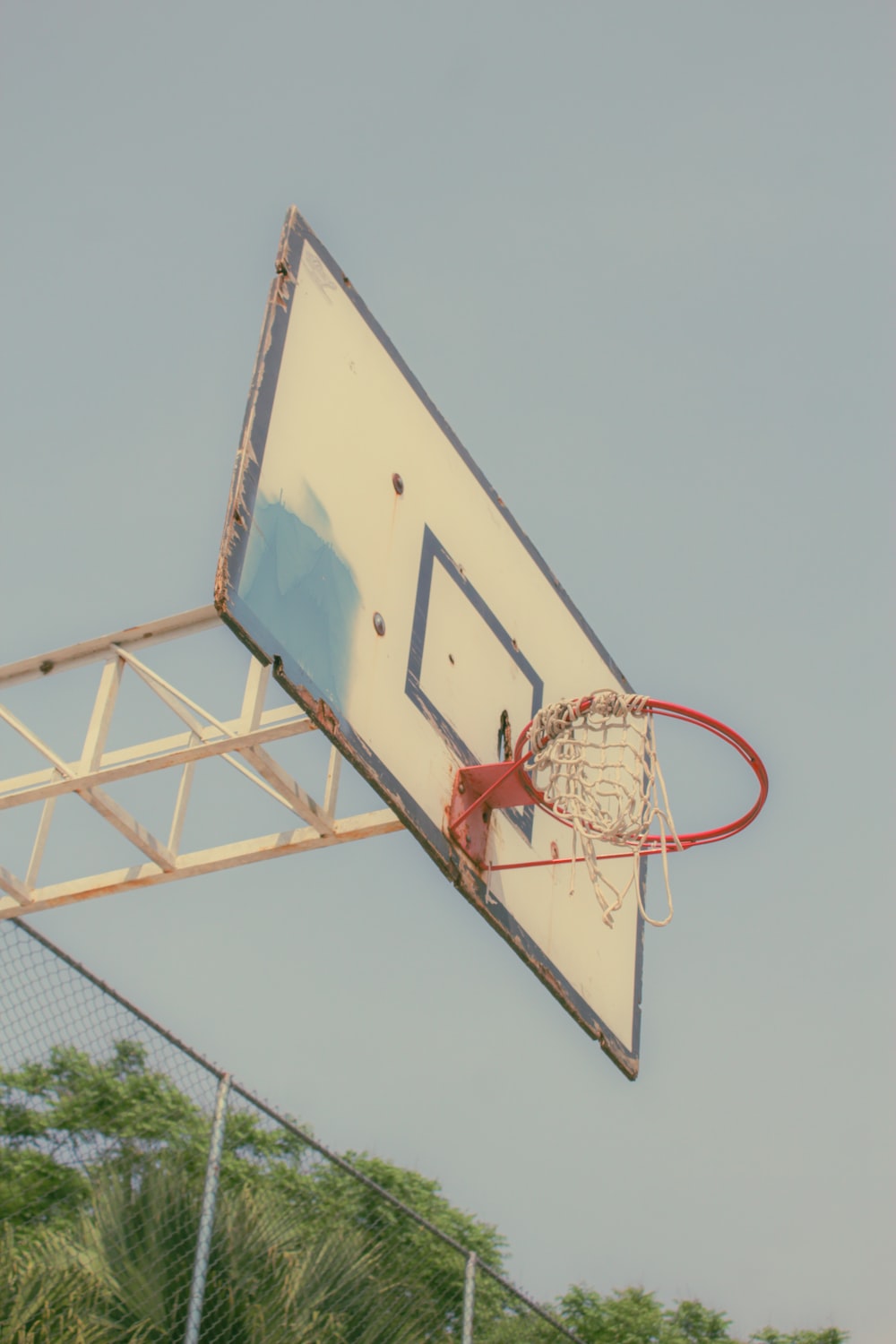 a basketball hoop with a basketball going through it