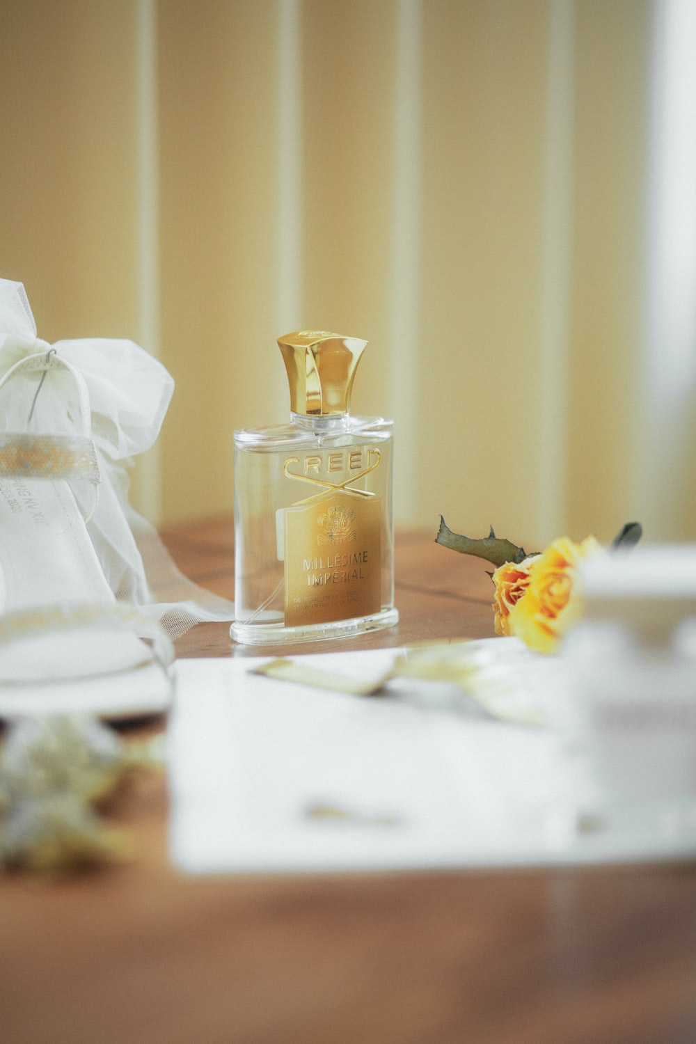 a bottle of perfume on a table