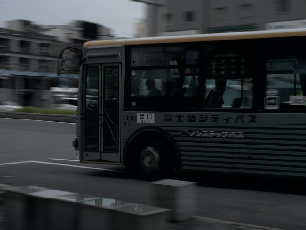 a bus driving down the street