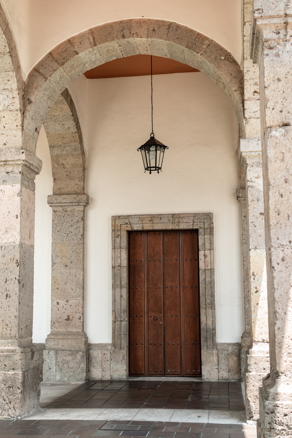a doorway with a light hanging from it's side