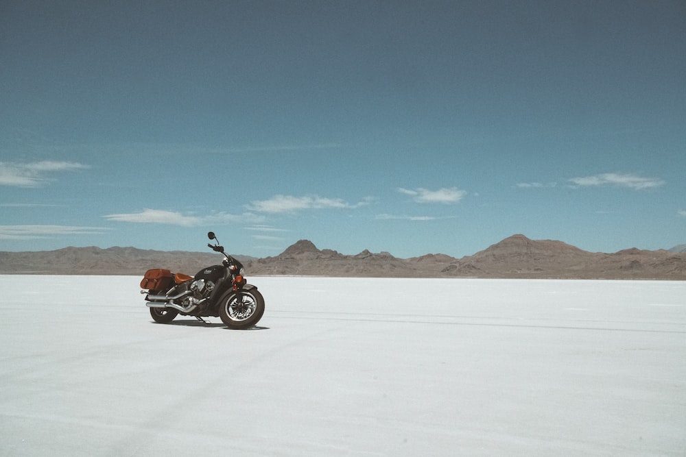 a motorcycle parked in a desert