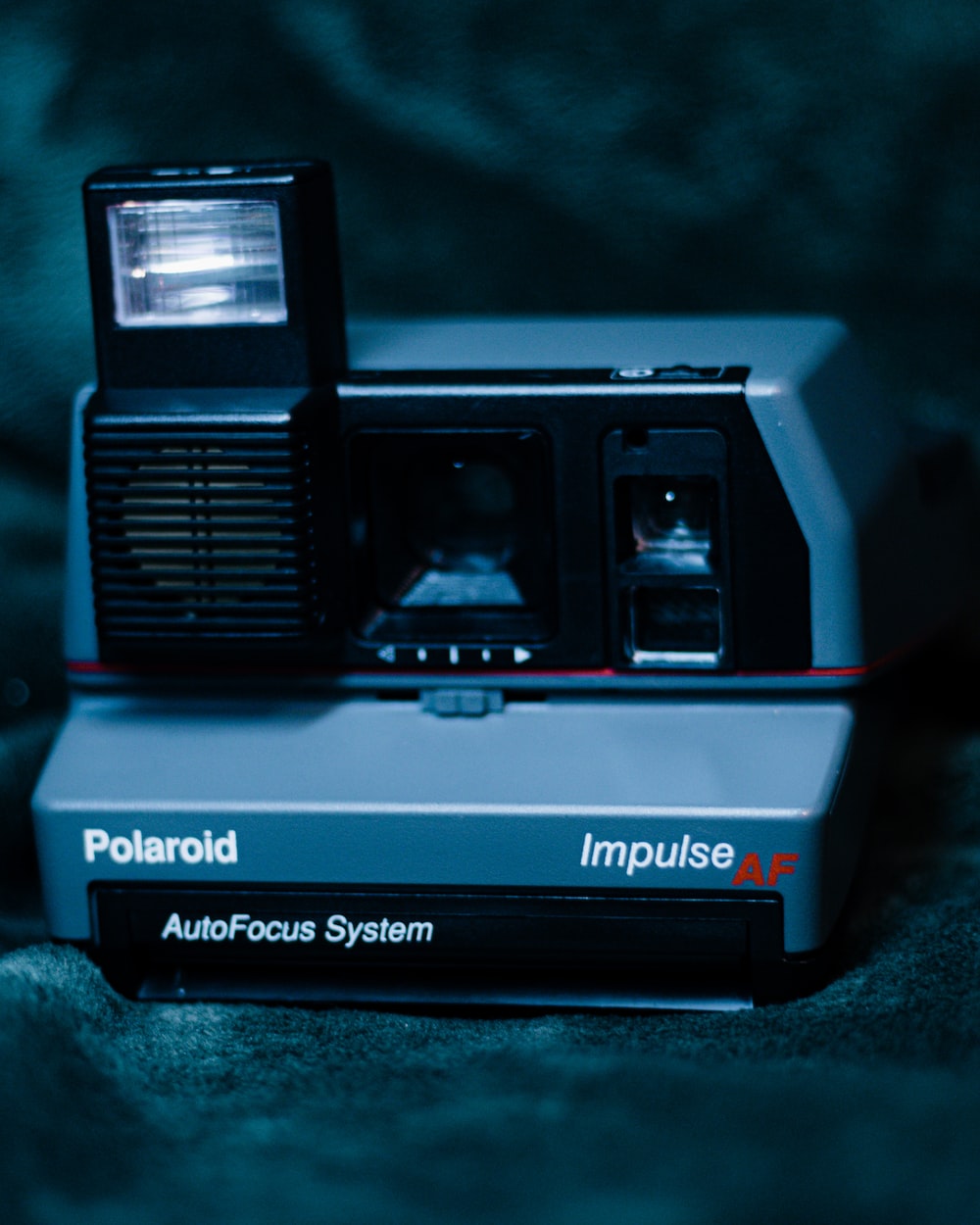a polaroid camera sitting on top of a table