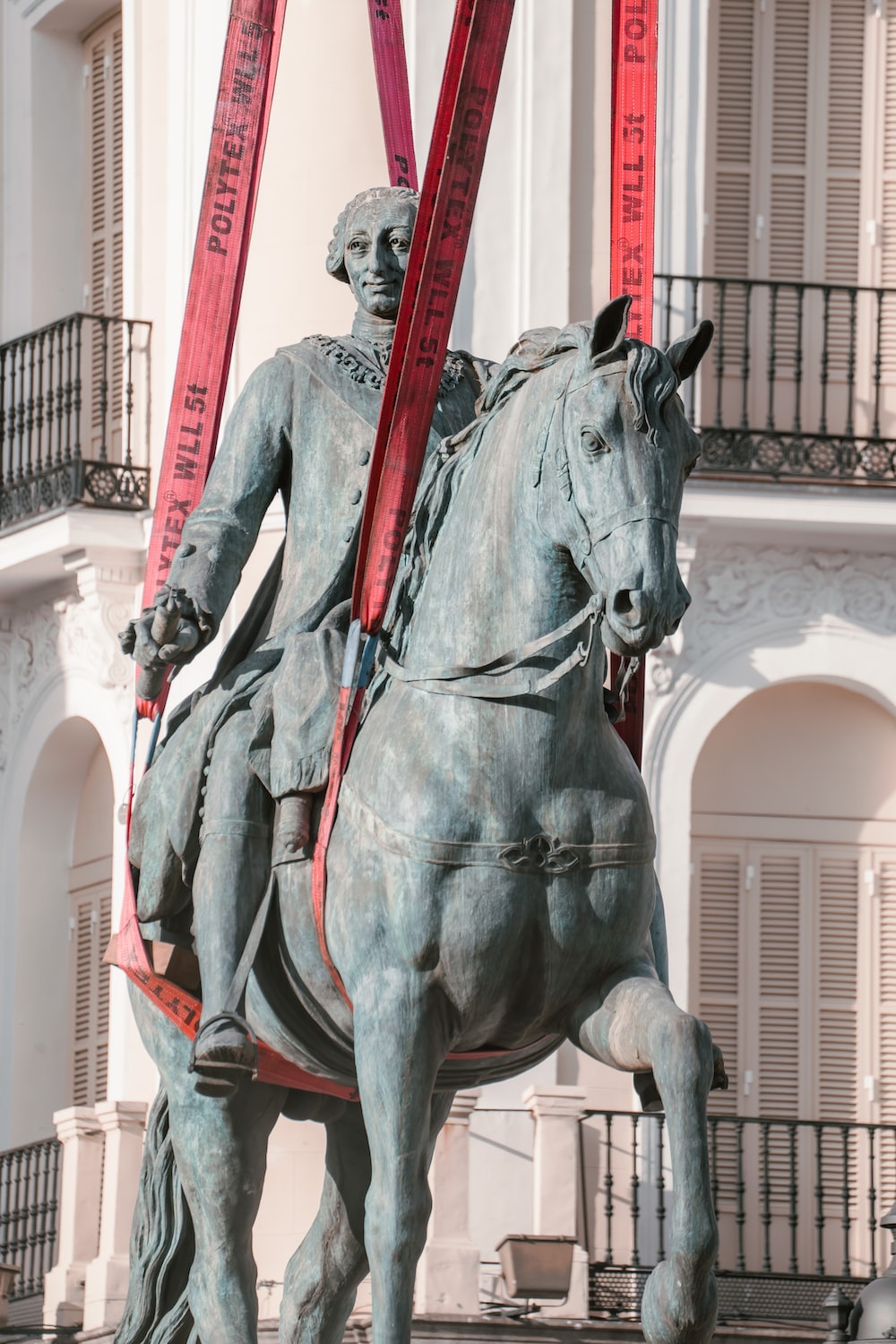a statue of a man sitting on a horse