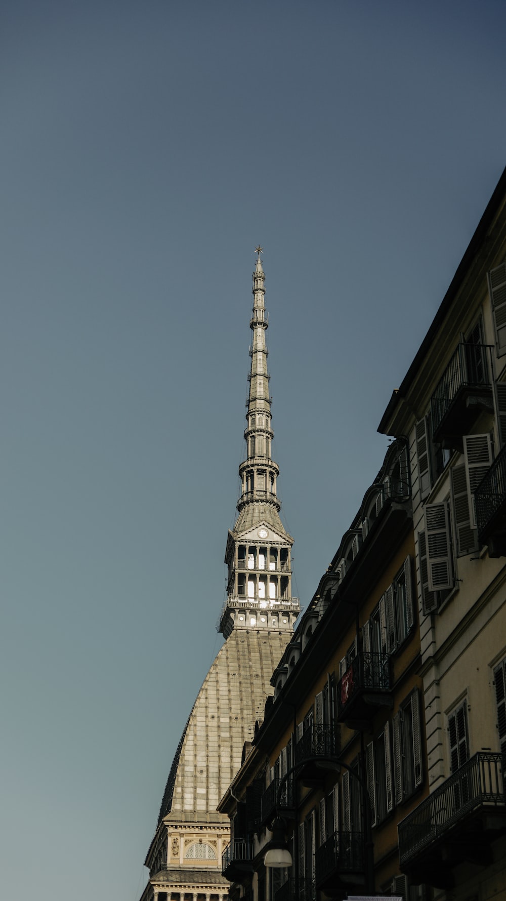 a tall building with a spire on top of it