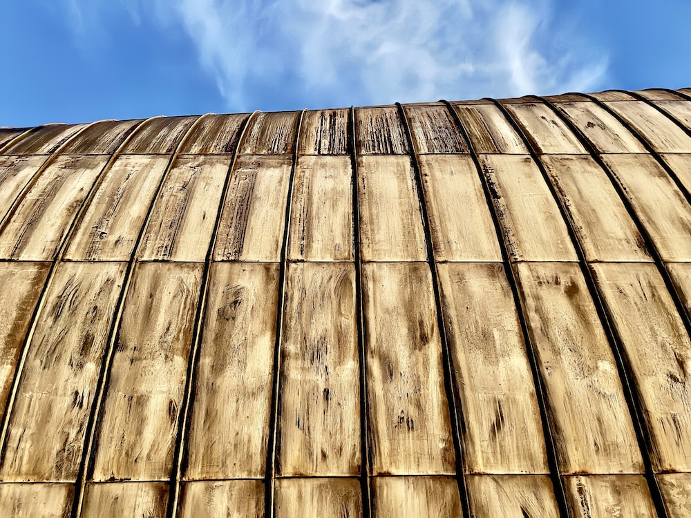 a wooden structure with a sky background