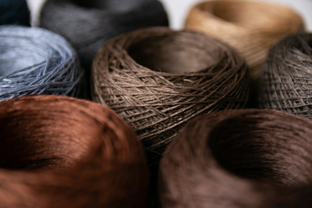 brown and black rolled yarn
