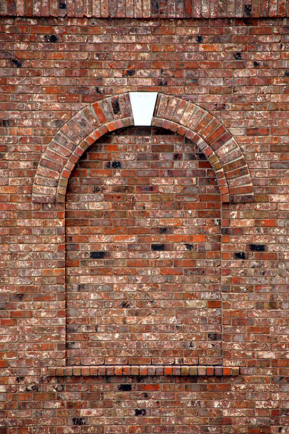 brown brick wall with hole