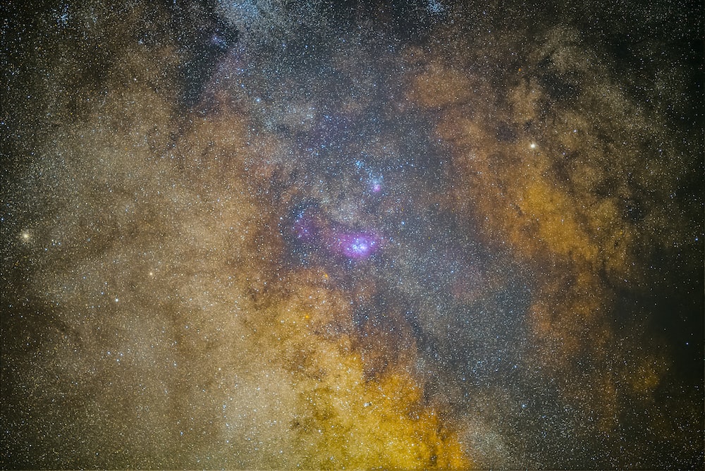 closeup photo of brown and purple galaxy