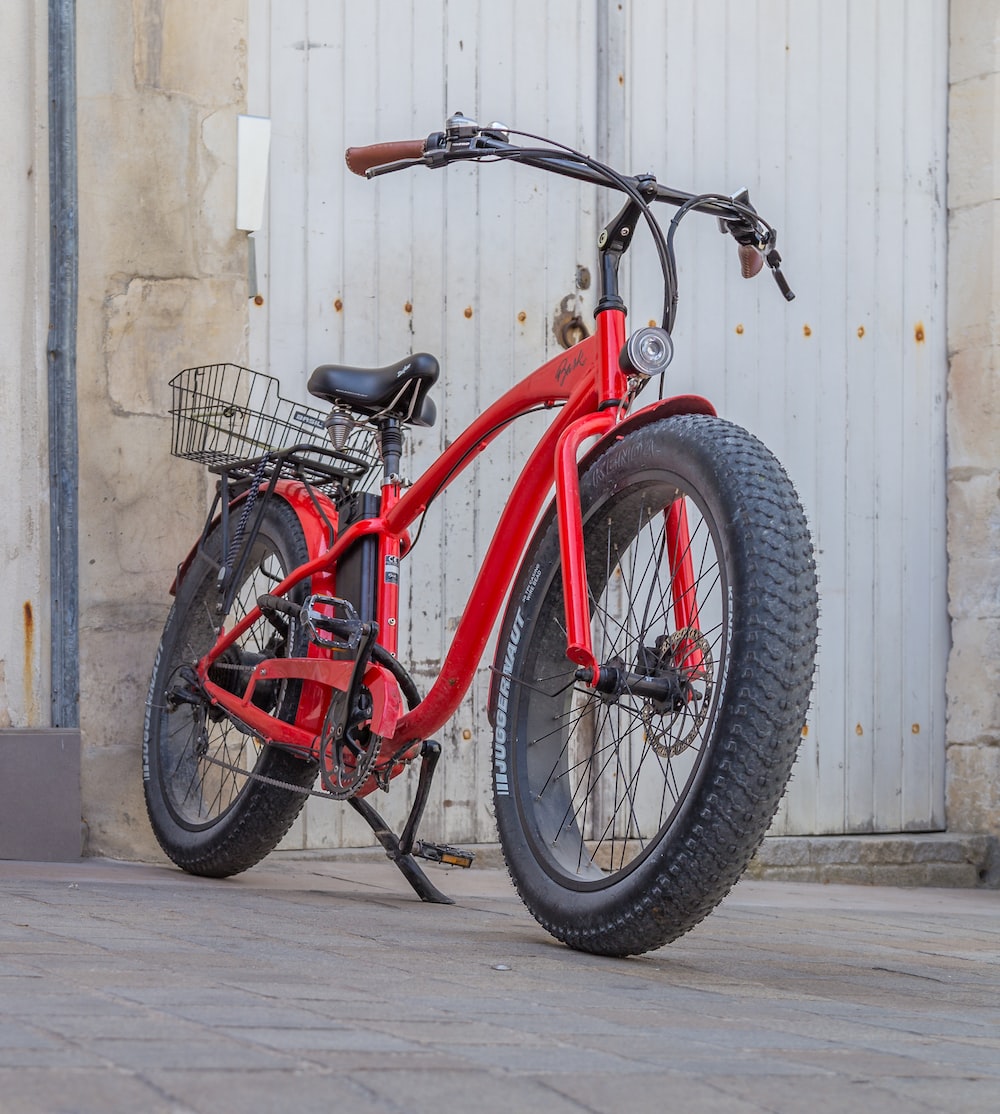 red and black city bicycle