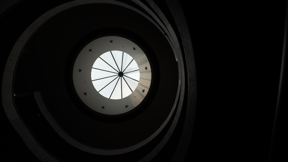 white and black round ceiling light