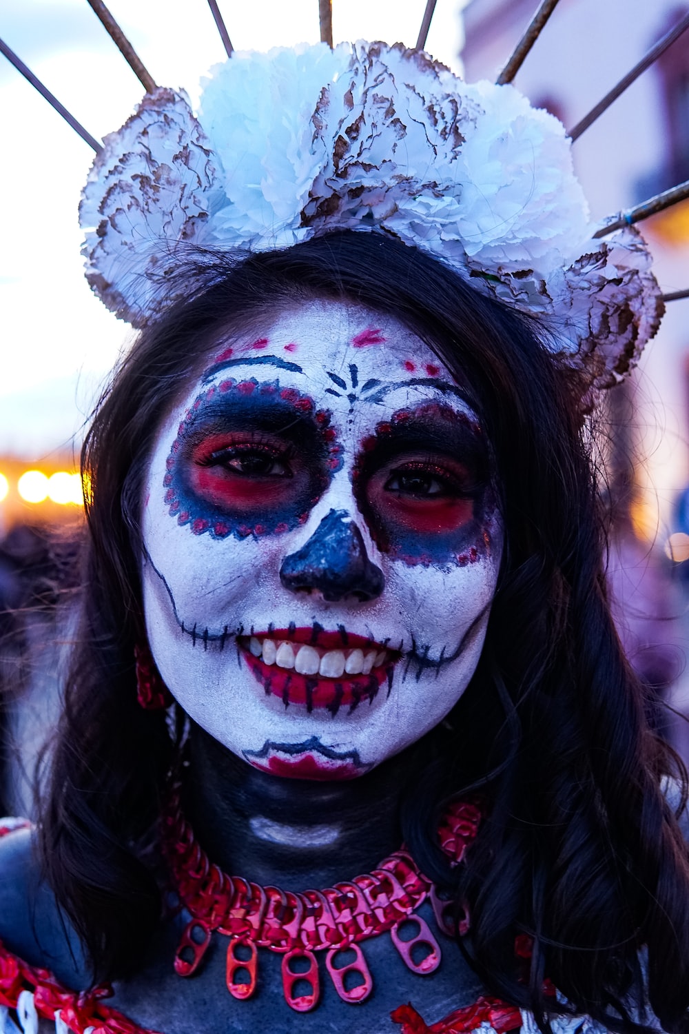 woman wearing calavera face paint